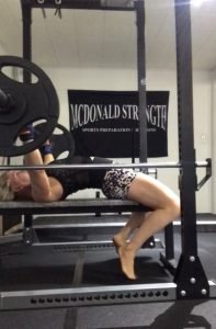 Jenelle Schultz training bench in her home gym