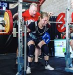 powerlifting4women Hannah Altman squatting at a powerlifting competition at BNB Brisbane North Barbell